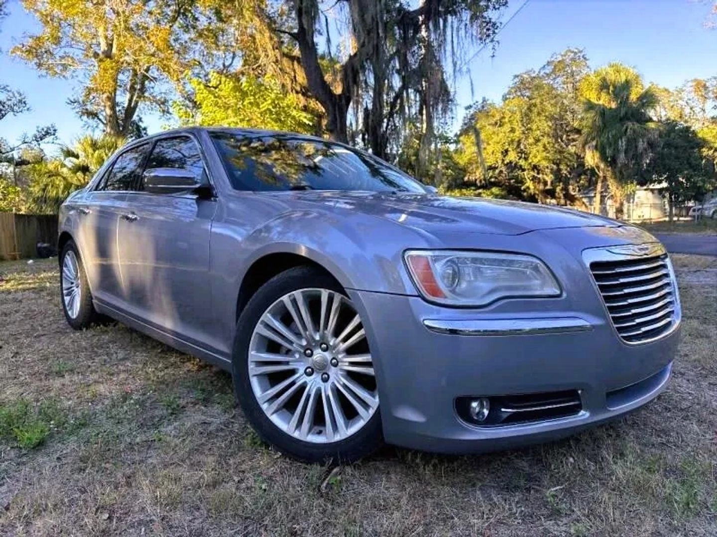 2014 Chrysler 300  300 in front of Clock Tower Mall Used car business